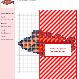 Cross-stitch pattern showcasing a detailed rock fish design using orange, red, and dark blue threads on 14-count white aida fabric.
