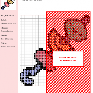 Cross stitch pattern depicting a colorful skewer of food. The design features various shades of orange, pink, purple, and green, stitched on 14-count white Aida fabric.