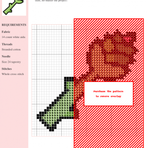Cross-stitch pattern of an asparagus spear, featuring green and red tones. The design is charted on a grid with color key.