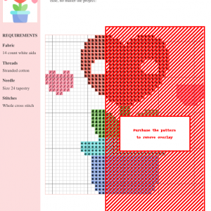 Cross stitch pattern featuring a cute potted plant with heart-shaped leaves, in various shades of red, pink, green, and purple. The design is presented on a grid.