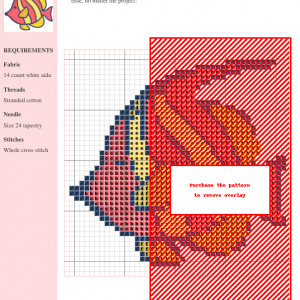 Cross-stitch pattern of a colorful angelfish, featuring red, orange, yellow, and dark blue threads on white aida cloth.