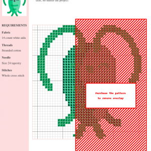 Cross-stitch pattern design of a plankton, featuring teal and olive green stitches on white aida cloth. A portion of the design is obscured by a red overlay.