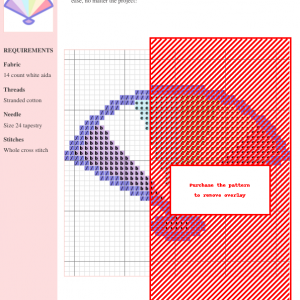 Image of a cross-stitch pattern depicting a paper fan in shades of red, orange, and purple. The pattern includes a key and grid.