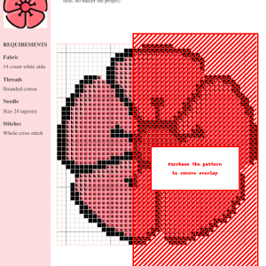 A cross-stitch pattern depicting a pink hibiscus flower. The image shows a grid with color-coded symbols indicating the stitching pattern.
