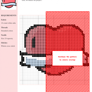 Cross-stitch pattern image showcasing a charming heart design in shades of pink and red, with clear grid and color-coded symbols.