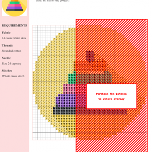 Image of a cross-stitch pattern depicting a colorful pyramid design, using various shades and DMC/Anchor thread color numbers.