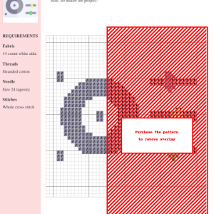 Cross-stitch pattern design of a turntable, featuring a gray turntable image on a white aida cloth background. The full design is partially obscured by a red overlay.