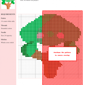 Image shows a cross-stitch pattern of a charming tree with green leaves and a red trunk, using green, brown, and red threads on 14-count white Aida cloth.