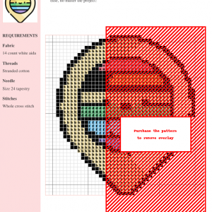Cross-stitch pattern featuring a circular design with a rainbow-colored half and a fiery orange and red half, ready for stitching.