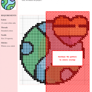 Cross-stitch pattern depicting a heart-shaped globe with rainbow colors, representing World Pride Day. Includes a key and materials list.