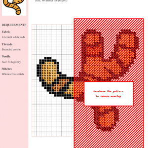 Cross stitch pattern of a stylized ginger root in warm orange and brown hues on a white aida cloth.