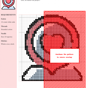 Cross stitch pattern featuring a stylized floral design in shades of pink, red, and light blue on a white background. The design includes clear grid markings for easy stitching.