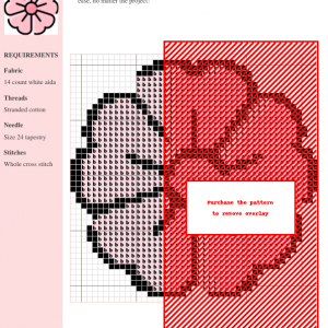 Cross stitch pattern of a pink sakura blossom, featuring a grid with symbols representing stitches. The design includes detailed shading.