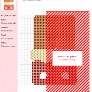 Image of a cross-stitch pattern depicting a chocolate bar design, featuring brown, red, and beige color threads on a white aida cloth.