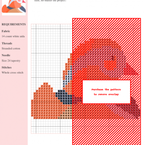 Cross stitch pattern depicting a mandarin duck in shades of orange, black, and white on a white aida cloth. The image shows a portion of the completed design.