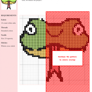 Cross-stitch pattern of a cute snake with green body and red accents. The design includes clear gridlines and color codes.