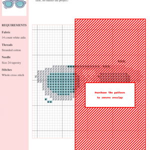Cross stitch pattern of a pair of glasses, featuring teal and gray thread colors on white aida fabric. A partially obscured design is shown.