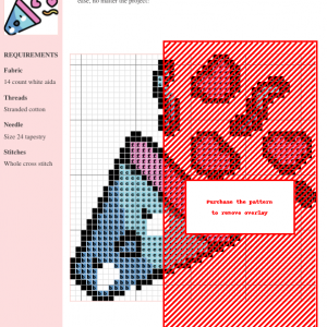 Image of a cross-stitch pattern featuring a confetti design in shades of pink, blue, and red on white aida cloth.