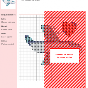 Cross stitch pattern featuring a vintage airplane carrying a heart, rendered in shades of red, gray, and blue on white aida cloth.