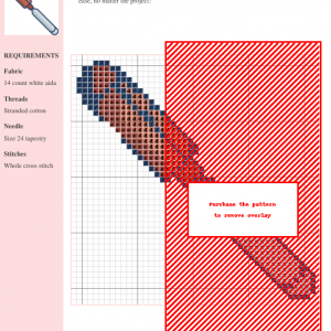 A modern geometric cross-stitch pattern featuring shades of brown and blue on white aida cloth. The pattern is partially obscured by a red overlay.