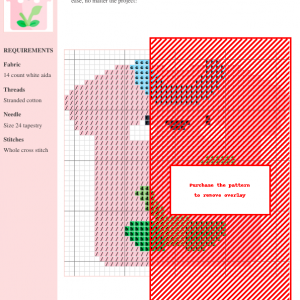 Cross stitch pattern of a pink t-shirt with a smiling face and a small green plant design.