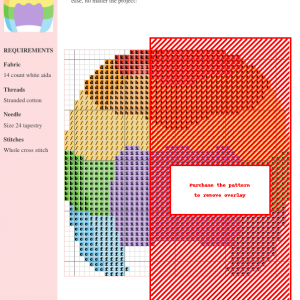 Cross stitch pattern depicting a rainbow-colored wig, featuring a purple base and stripes of red, orange, yellow, green, and blue.