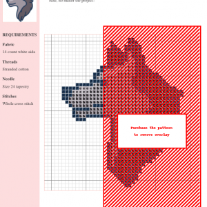 Image of a charming wolf head cross stitch pattern design. The wolf is depicted in profile, with shades of grey and blue, featuring a detailed coat and expressive eyes.