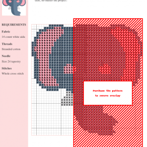 Image of a charming cross-stitch pattern depicting a stylized elephant's head, featuring soft pink ears and cheeks against a slate blue body.