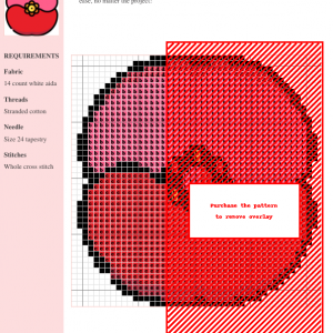 Image of a cross stitch pattern depicting a stylized poinsettia flower in shades of red and pink with a yellow center.