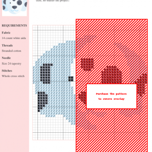 Cross stitch pattern featuring a charming Dalmatian puppy's head, rendered in soft blue and gray tones.