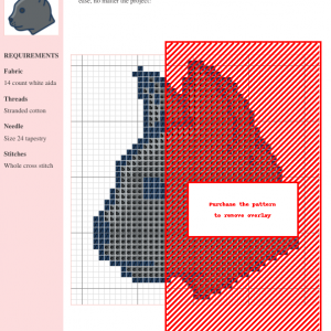 Cross stitch pattern featuring a charming profile of a grey cat with pink ears.