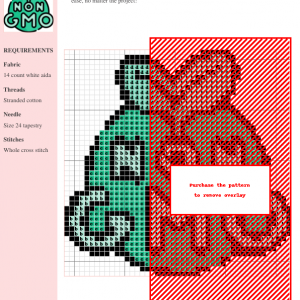 Image of a cross stitch pattern featuring the words 'NON GMO' in a teal circle with two green leaves sprouting from the top.