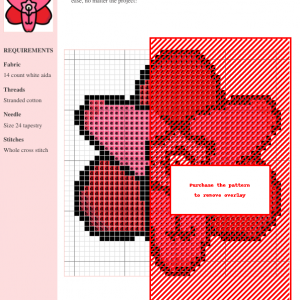 Amaryllis flower cross stitch pattern featuring red and pink petals, a detailed center, and black outlines.