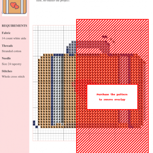 Cross stitch pattern of a tan suitcase with two red hearts, perfect for crafting projects.