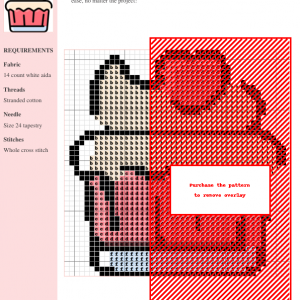 Image of a charming cupcake cross stitch pattern featuring a pink cupcake with cream frosting and a heart-shaped cherry on top.