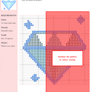 A cross-stitch pattern depicting a light blue diamond with sparkling accents.
