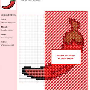 Image of a cross stitch pattern depicting a vibrant red chili pepper with a green stem.