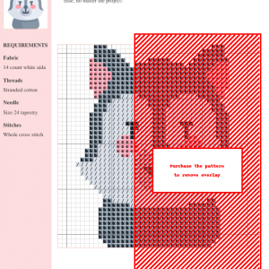 Image of a charming cross-stitch pattern featuring a stylized wolf with gray fur, pink cheeks, and a friendly expression.