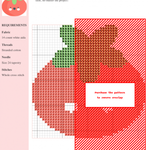 Image of a charming cross-stitch pattern depicting a smiling tomato with simple green leaves.