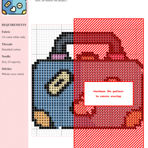 Cross stitch pattern depicting a blue suitcase adorned with travel stickers, including a heart and labels.