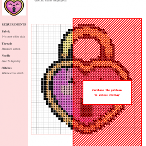 Cross stitch pattern depicting a cute heart-shaped padlock with a smiling face, featuring pink and gold colors.