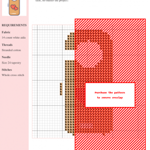 Image of a cross-stitch pattern depicting two red hearts on a tan door hanger.