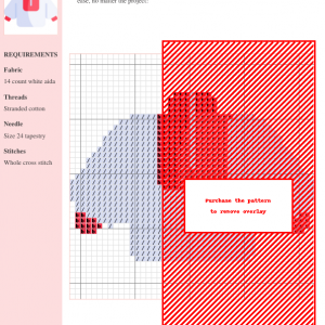 Cross stitch pattern of a white zip-up sweater with red accents on the collar and cuffs.