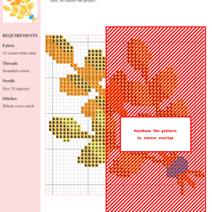 Image of a cross stitch pattern depicting three stalks of wheat tied with a blue ribbon. The wheat is in shades of yellow and orange.