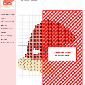 Cross stitch pattern depicting a cute, smiling Santa hat in red and cream.