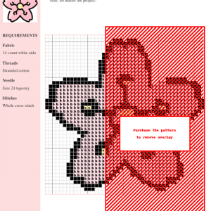 Image of a charming cherry blossom cross stitch pattern design featuring a pink flower with yellow center.