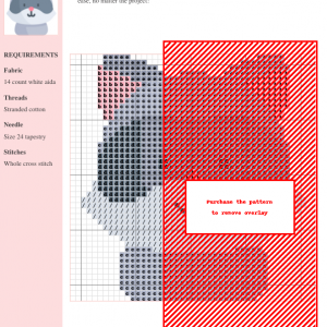 Cross stitch pattern featuring a charming, simplified design of a raccoon's face in shades of gray and pink.