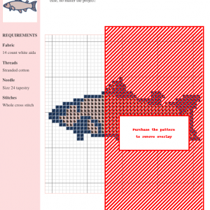 Cross stitch pattern depicting a salmon fish in muted pink and blue tones.
