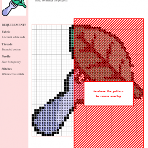 Image of a cross-stitch pattern depicting a fork with a green leaf delicately balanced on its tines.