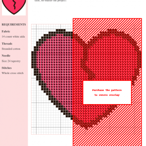 Image of a cross-stitch pattern depicting a broken heart in shades of pink and black. The design is simple yet striking, perfect for crafting projects.